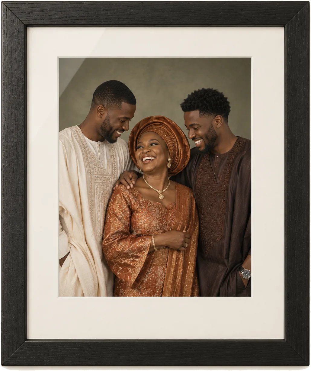 A mother laughing with her two grown sons, framed in black behind an ivory mat