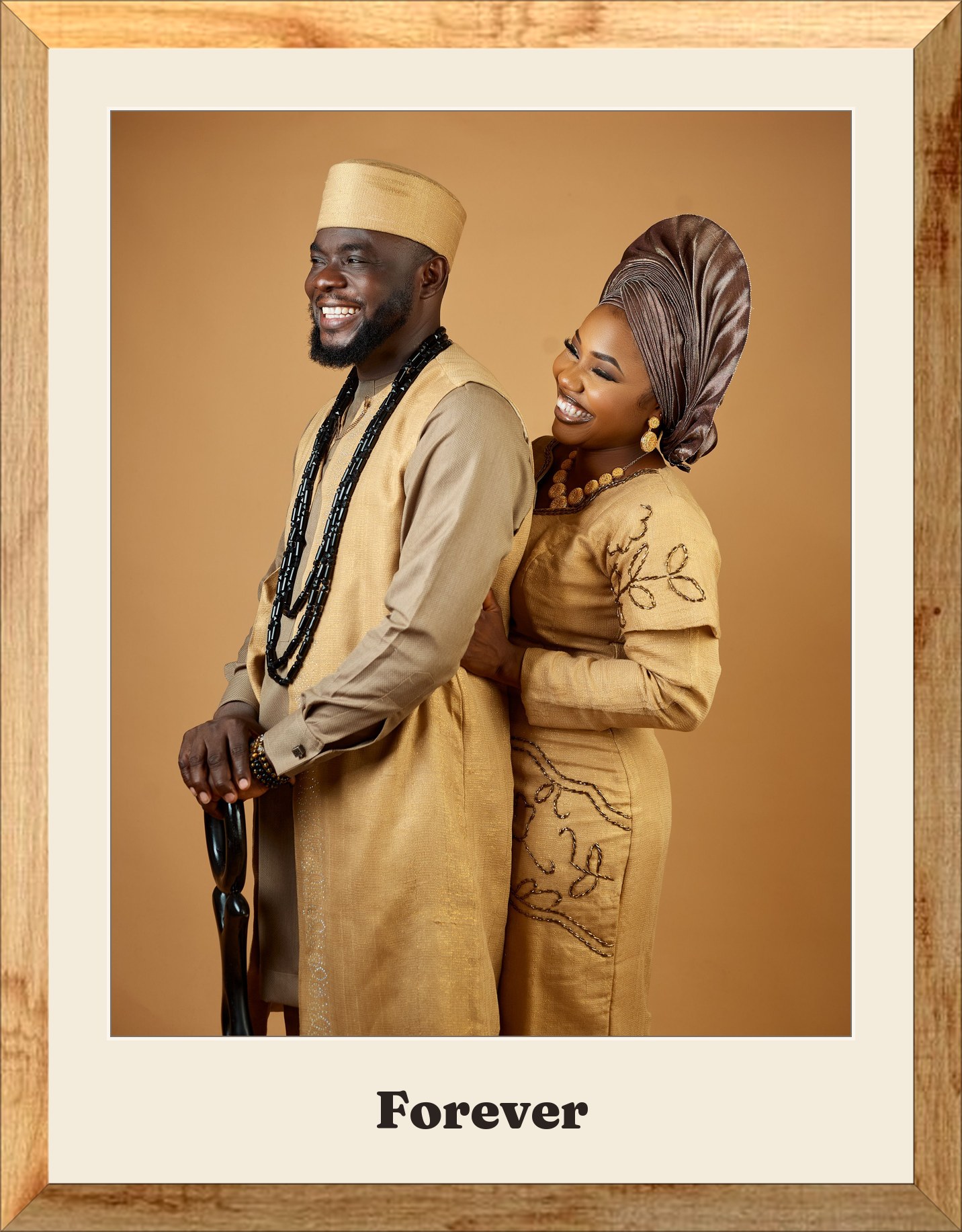 A couple in traditional gold, framed
